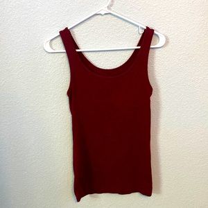 A medium Maroon a.new day tank top.